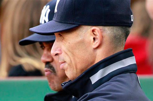 Joe Girardi looks on as the Yankees lost to Boston